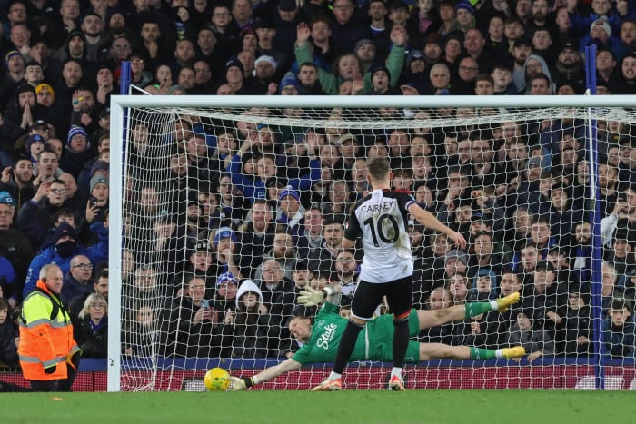 Fulham's Tom Cairney pictured narrowly beating Everton goalkeeper Jordan Pickford during a penalty shootout in the quarter-finals of the EFL Cup in December 2023